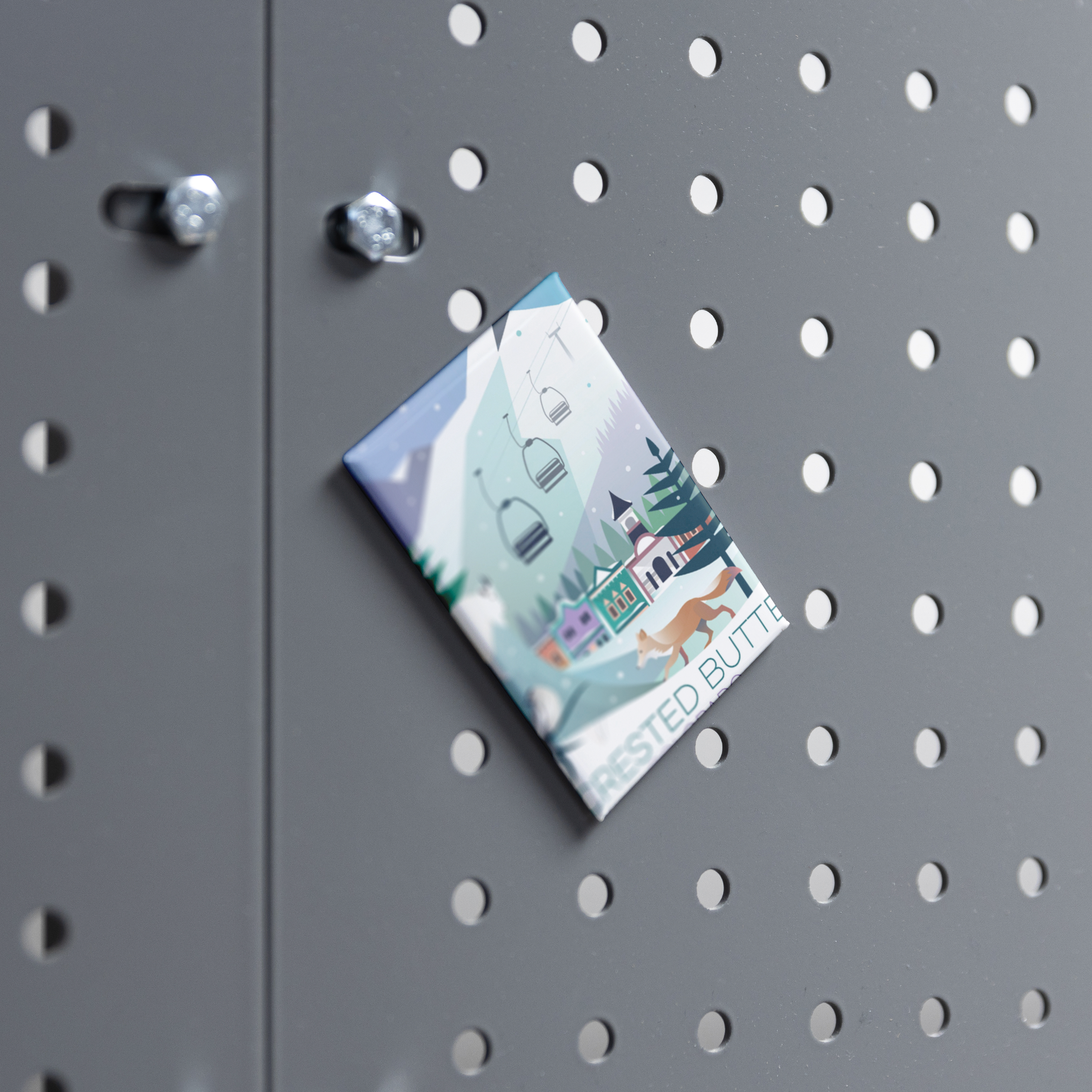 Crested_Bute_Winter_RectangleButtonMagnet_H_Workspace_Mockup.png